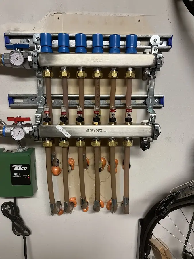 Plumber performing Water Heater Repair at a residential property in Elkridge